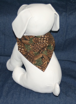 Stuffed dog modeling Large Pine Cone bandana