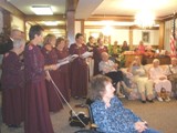Grand Family entertaining Residents with tunes.