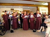 The Grand Officers sing....accompanied by WGM Billeta's mascots, skunks, Masonic Home Tea, 9/12/09