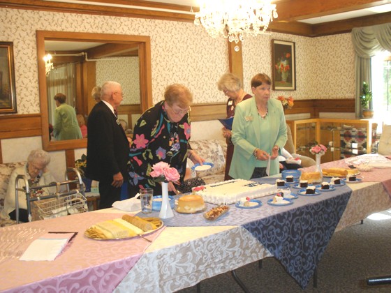 Serving Refreshments: Jeanie Knobbs & Diane Boley with WGP and WGM in the background, Masonic Home Tea, 9/12/09